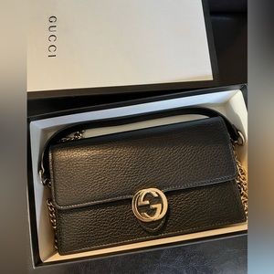 Gucci Black Crossbody Bag with Gold Accents